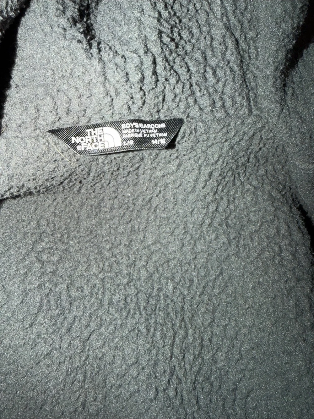Boys North Face‎ jacket with Sherpa lining in black. Wind/rain.